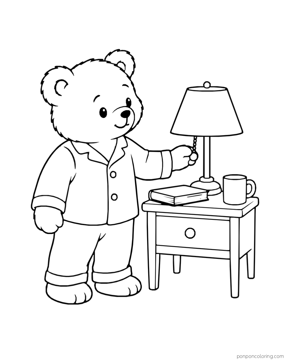 A bear in pajamas touching a table lamp beside a closed book and cup.