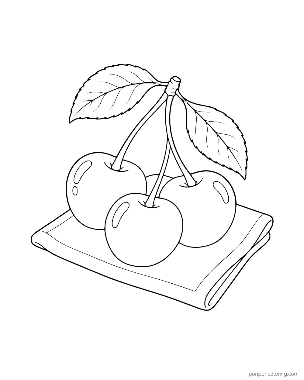Three cherries joined by their stems rest on a folded square cloth.