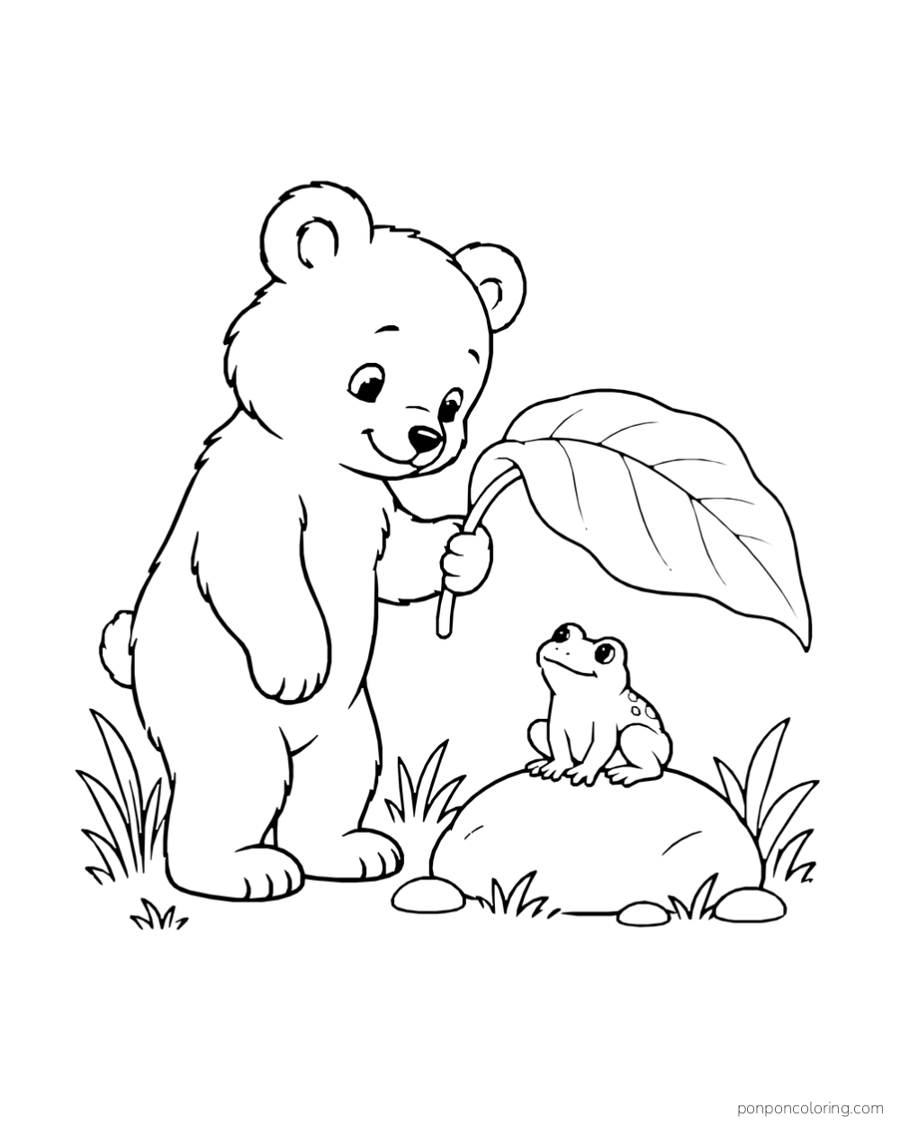 A bear cub holds a broad leaf above a small frog sitting on a stone.