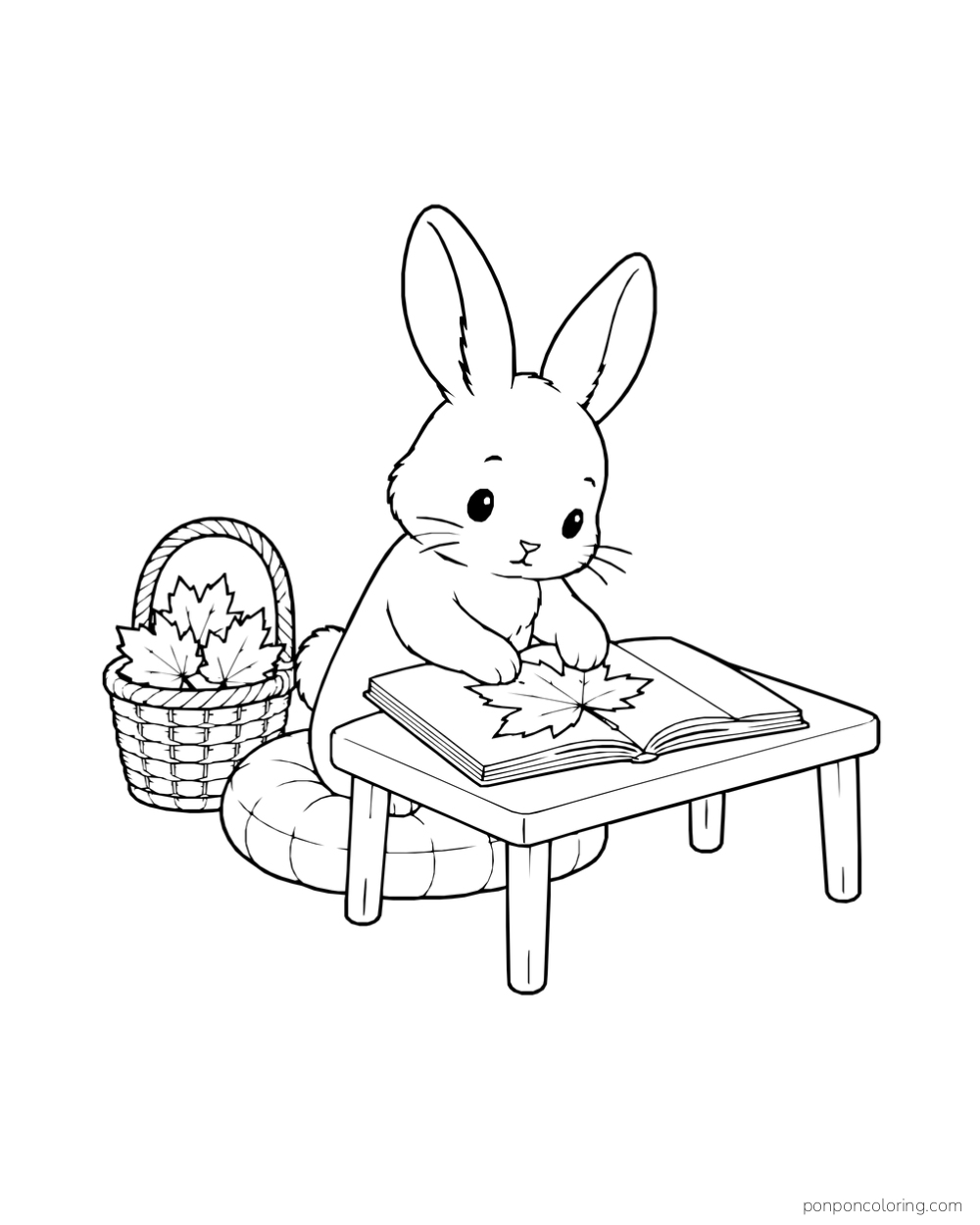 A rabbit presses a maple leaf into an open book at a low table, with a basket of leaves beside it.