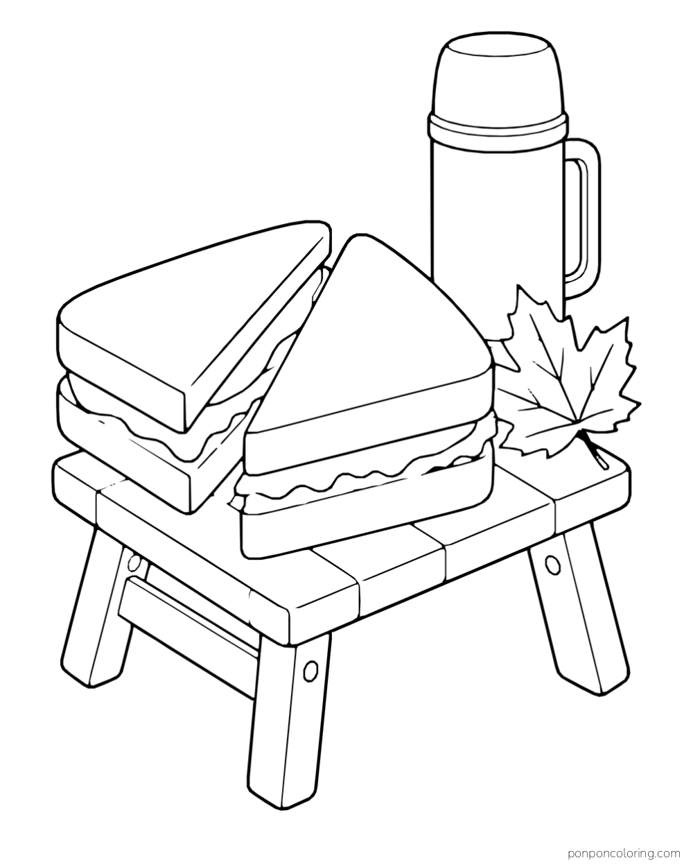 Two stacked bread sandwiches sit on a small picnic bench beside a thermos and a fallen leaf.