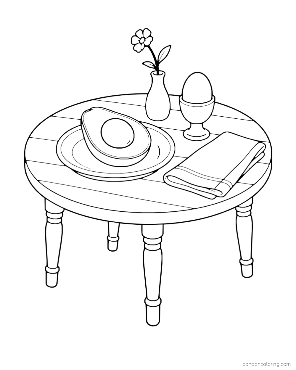 An avocado half sits on a rustic breakfast table beside an egg cup, napkin, and flower vase.