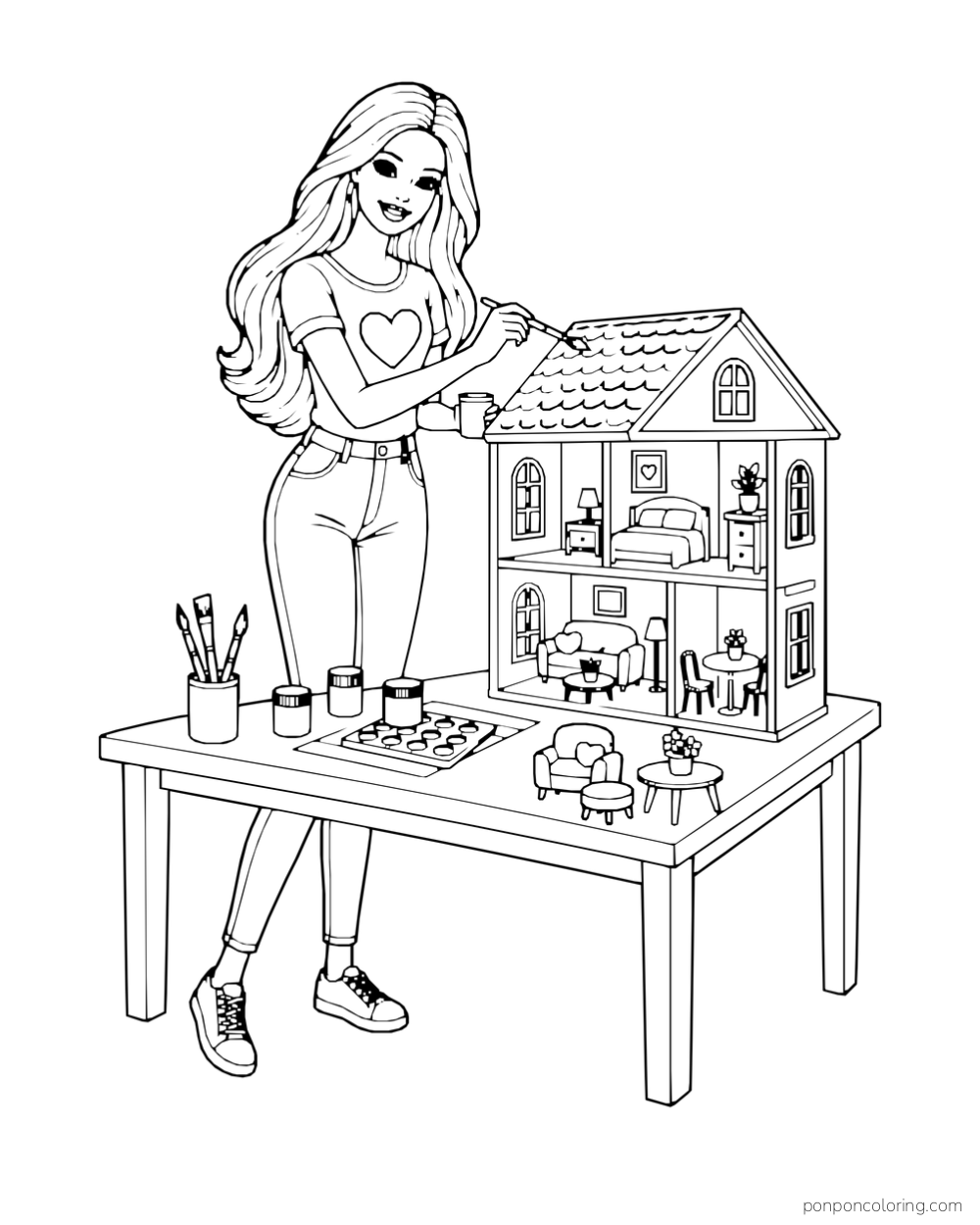 Barbie paints a dollhouse on a craft table with miniature furniture and art supplies.