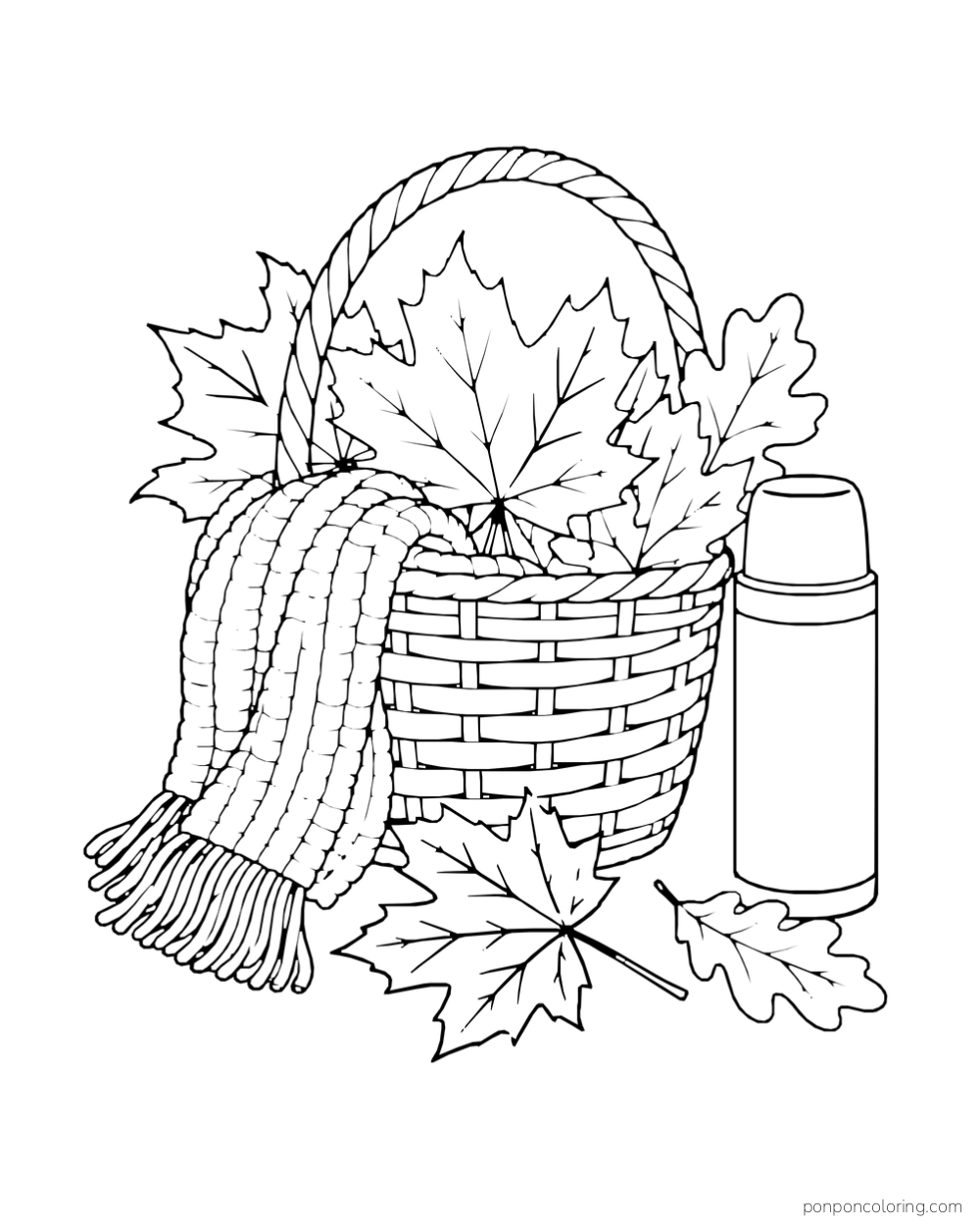 A scarf hangs over a basket filled with leaves beside a thermos.