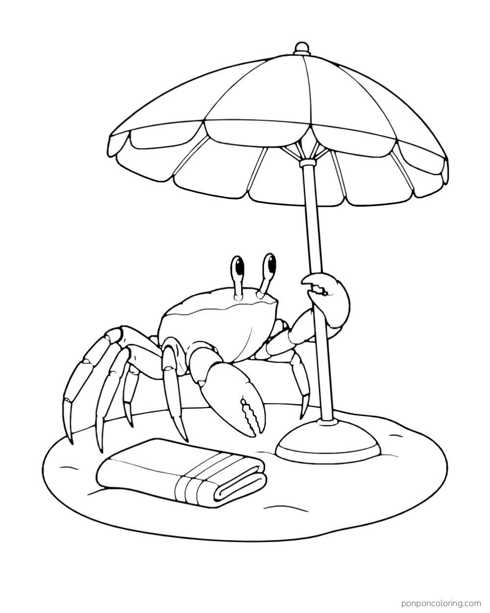 A crab holds the pole of a beach parasol beside a folded towel on sand.