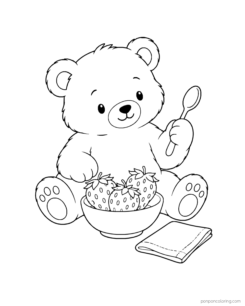 A bear cub lifts a spoon behind a bowl of strawberries, with a folded napkin nearby.