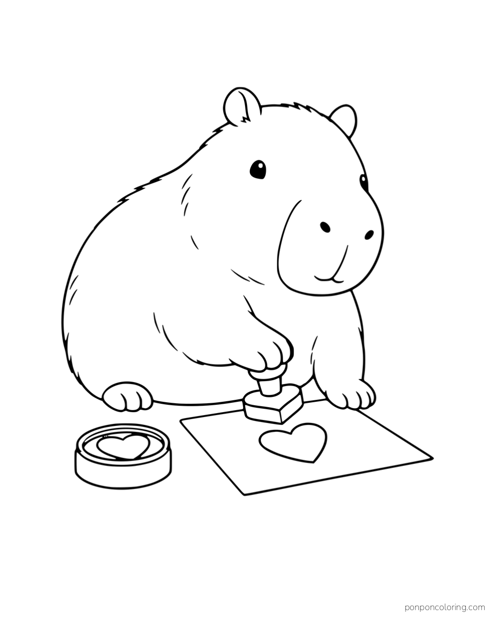 A capybara using a heart-shaped stamp on a sheet of paper.
