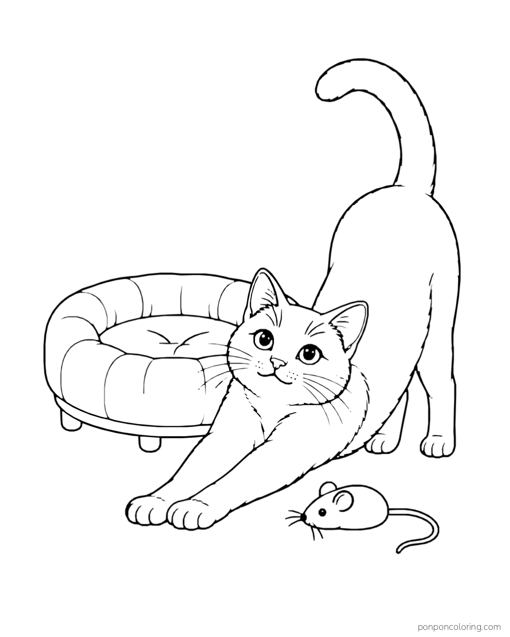 A cat stretches beside a round pet bed and a toy mouse.