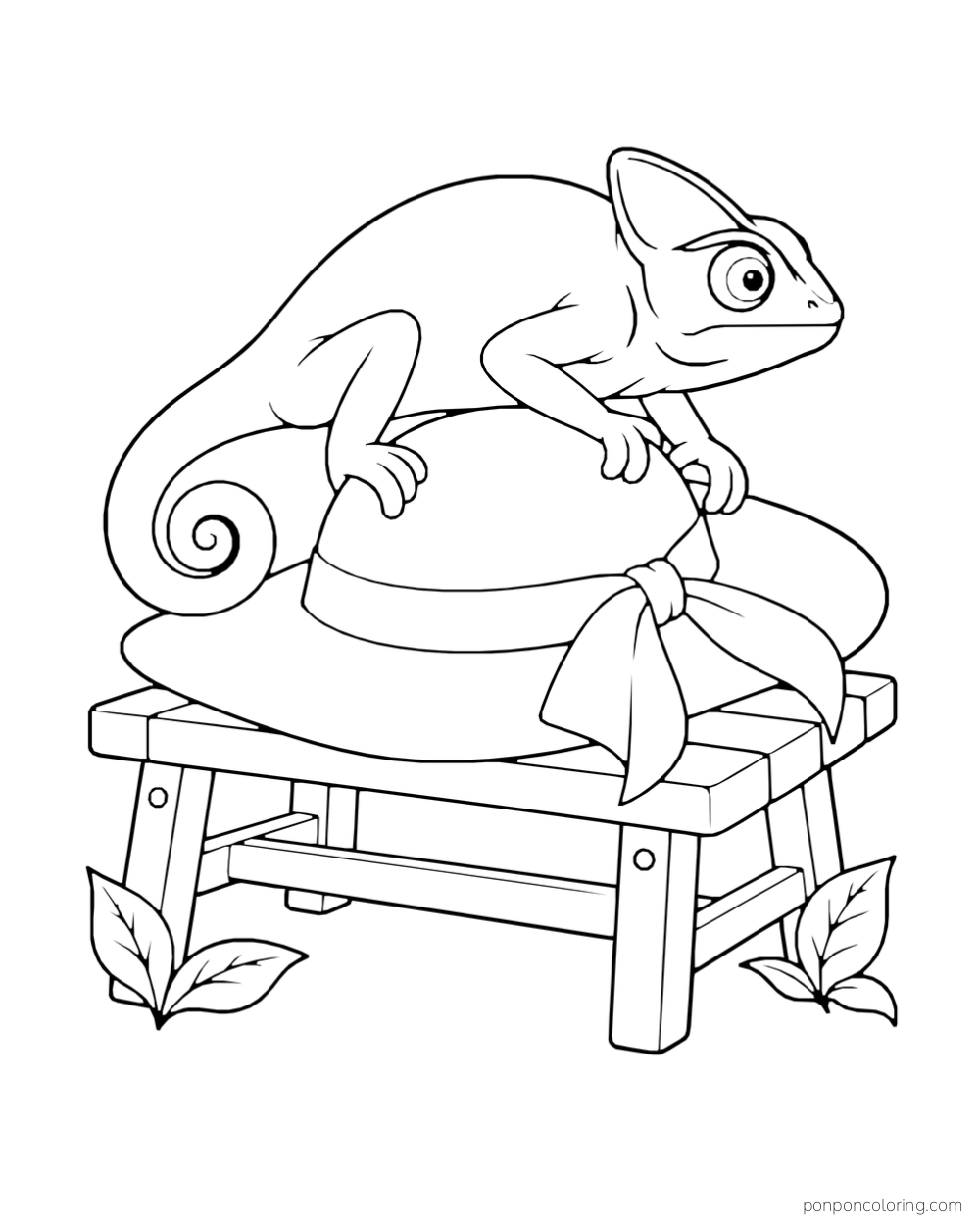 A chameleon with a curled tail rests on a broad sunhat placed on a low garden bench.
