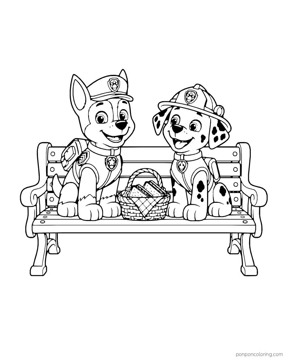 Chase and Marshall sit on a garden bench with a basket of sandwiches between them.