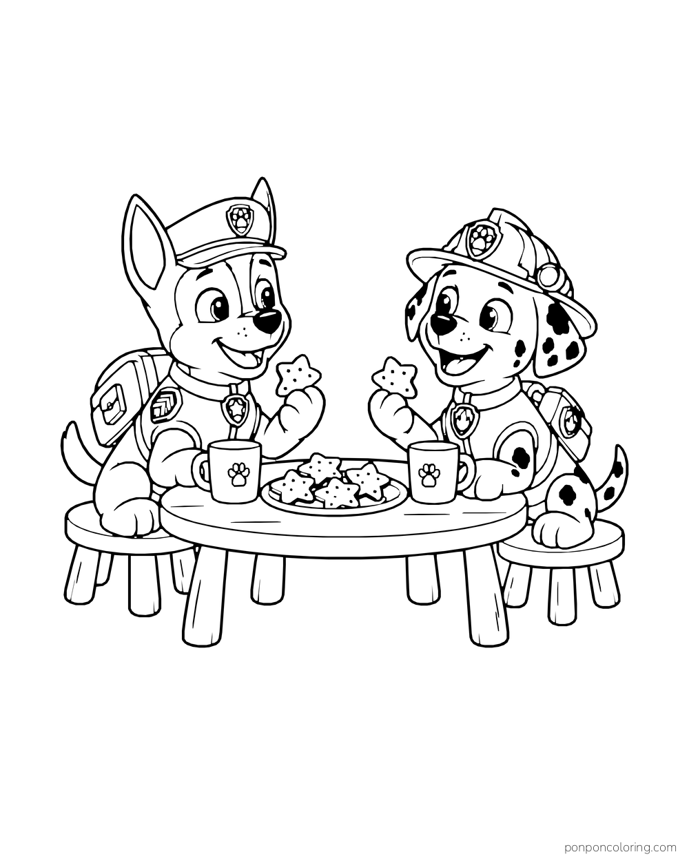 Chase and Marshall share star-shaped cookies and mugs at a round table.