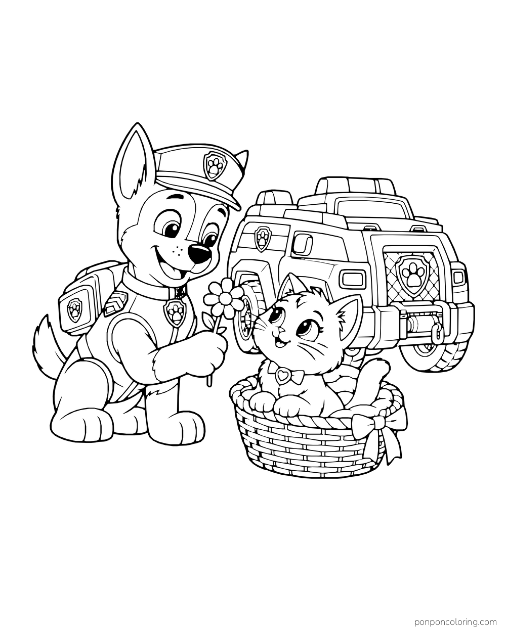 Chase holds a flower for a kitten in a basket beside a police rescue vehicle.