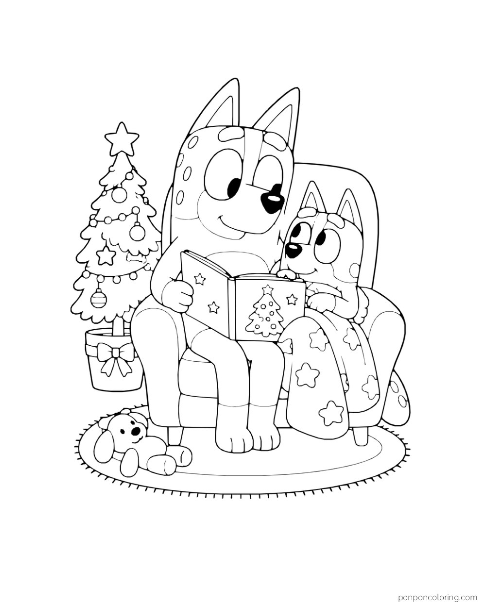 Chilli reads with Bingo in an armchair beside a small decorated Christmas tree and toy bunny.