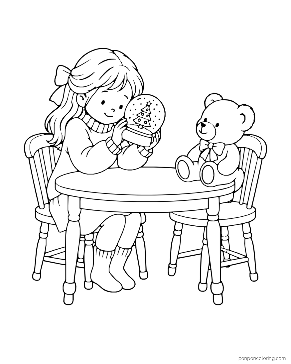A child holds a Christmas tree snow globe at a round table beside a teddy bear.