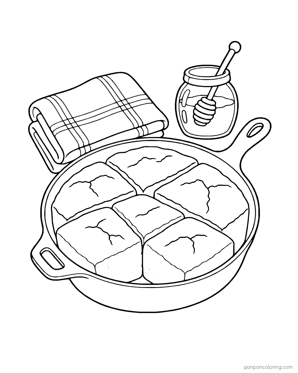 Six cornbread squares fill a skillet beside a folded towel and honey jar.