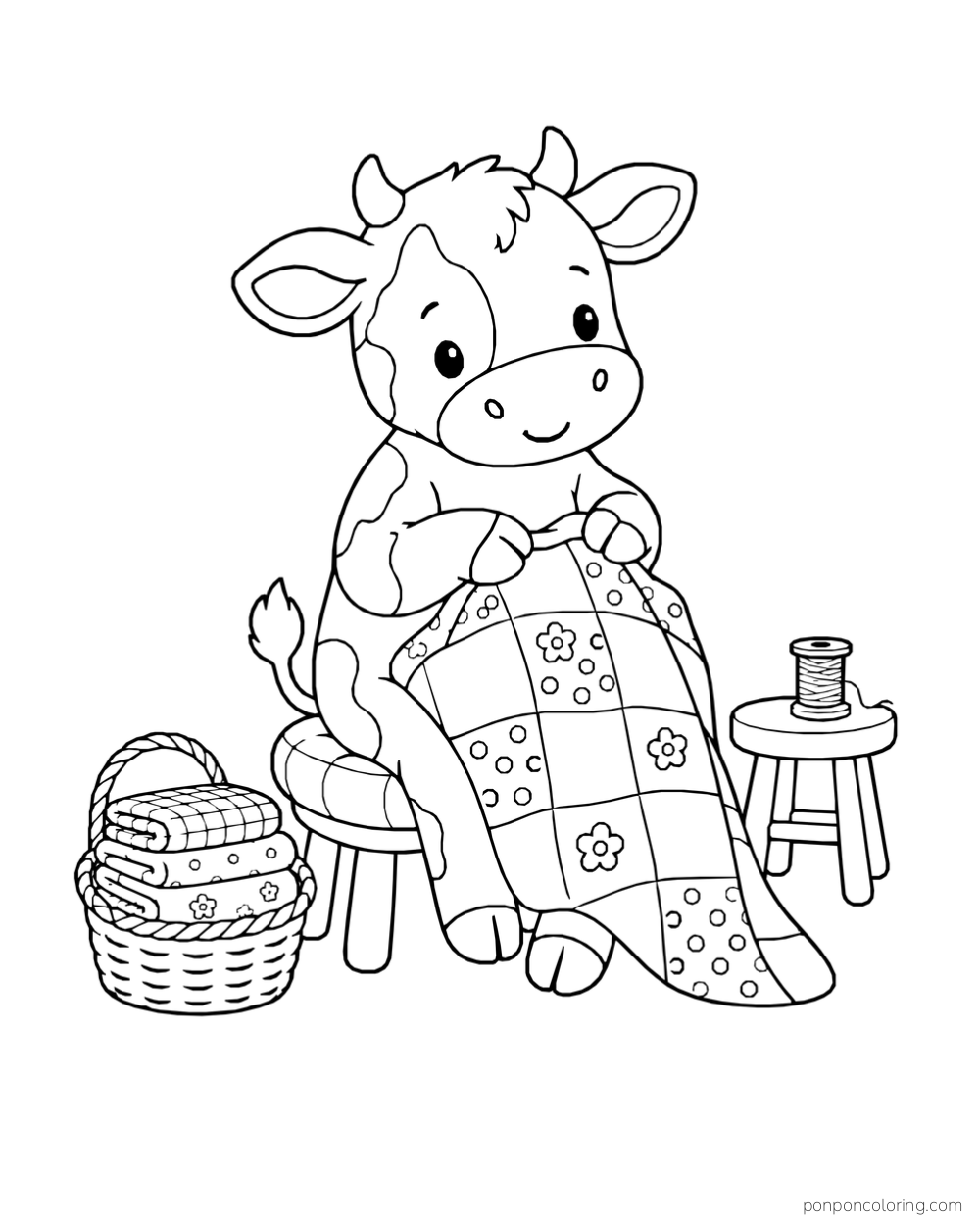 A seated cow holds a flower-and-dot patchwork quilt beside a basket of folded blankets and a thread spool on a stool.