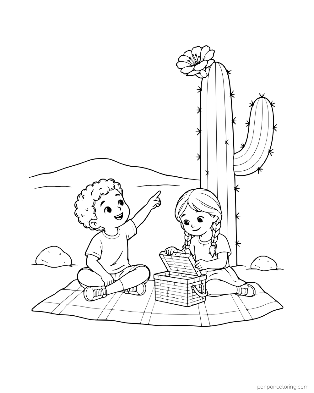 Two children sit on a picnic blanket beside a flowering saguaro and an open basket.