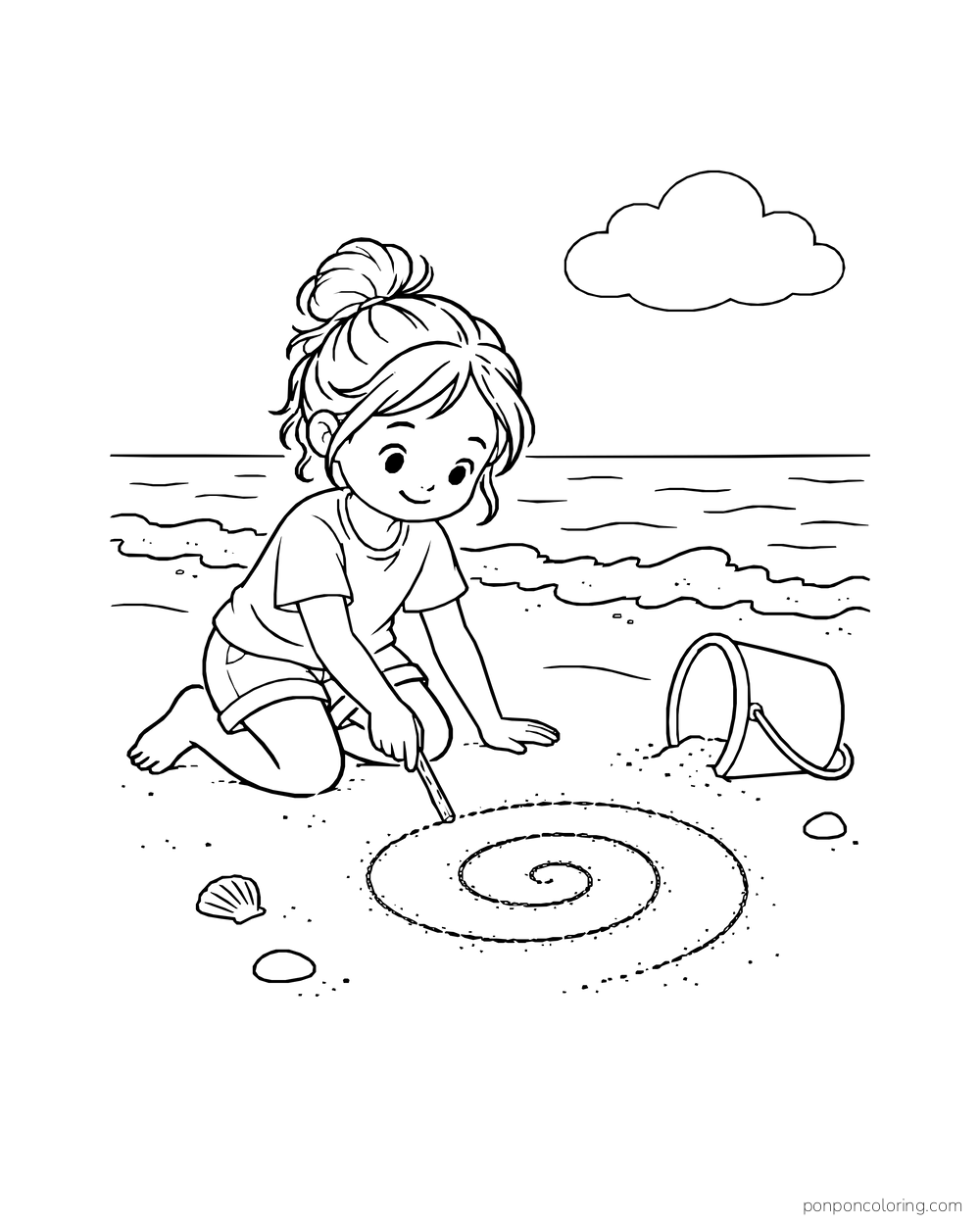A child kneels with a stick beside a large spiral drawn in beach sand.