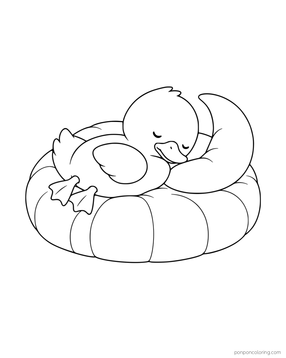 A duckling sleeping on a round cushion with a crescent-shaped pillow.