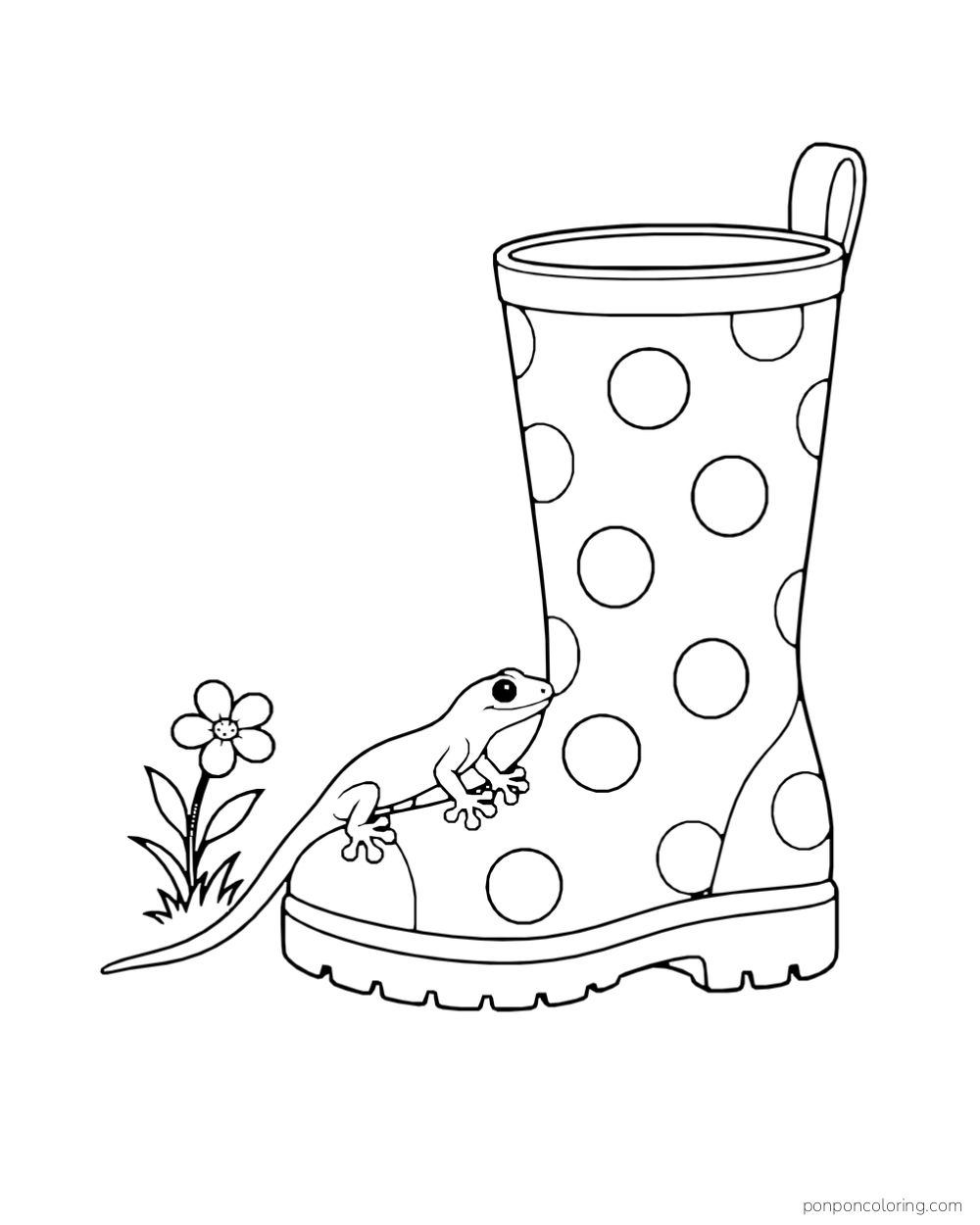 A small gecko grips the toe of a tall spotted rain boot beside a single flower.