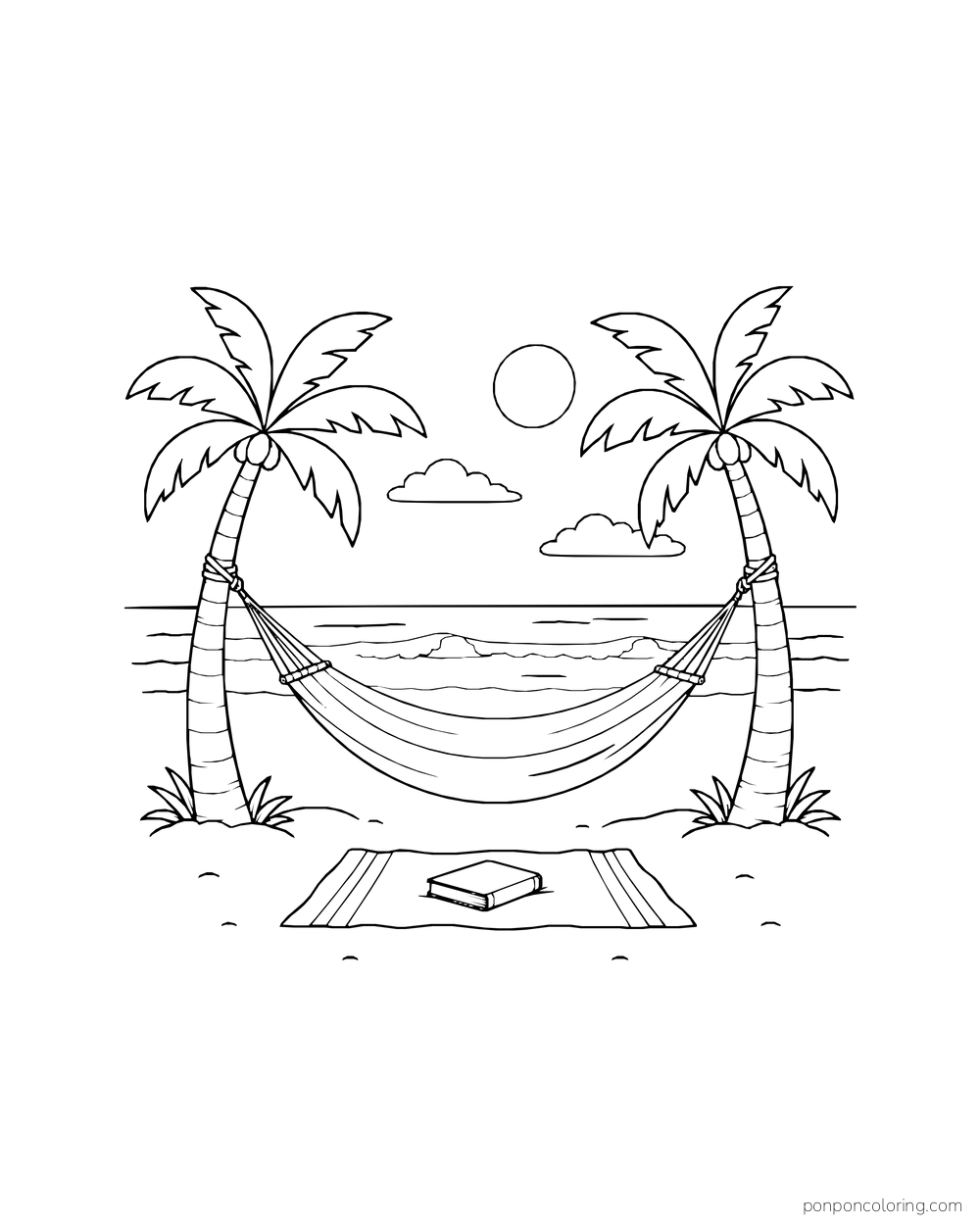 An empty hammock hangs between palm trees above a book on a towel.