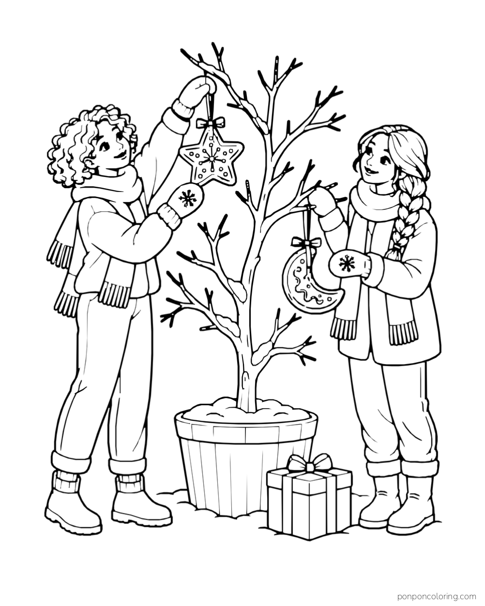 Two people hang star and crescent cookies on the branches of a small winter tree.