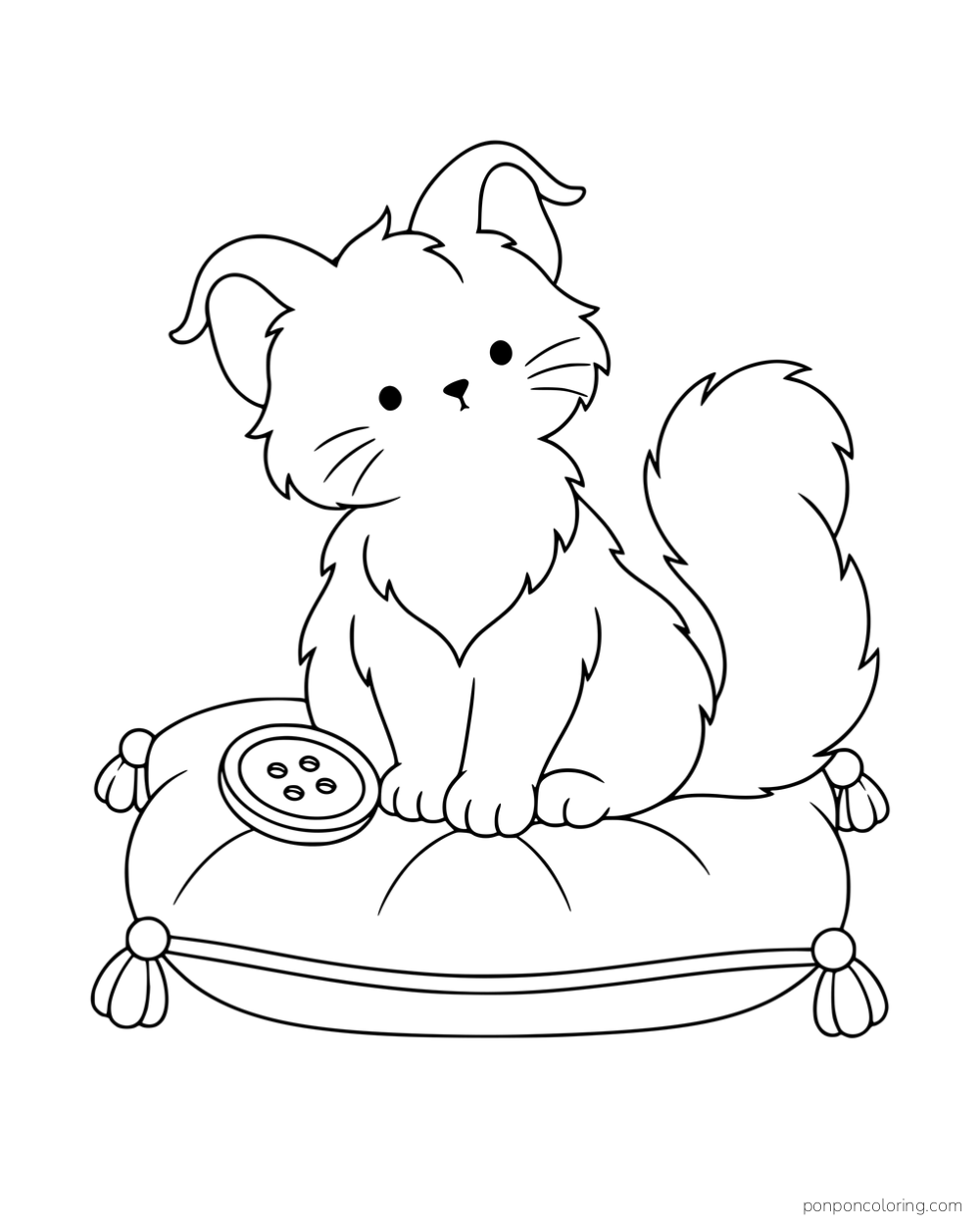 A kitten with curled ear tips sitting on a tasseled cushion beside a large button.