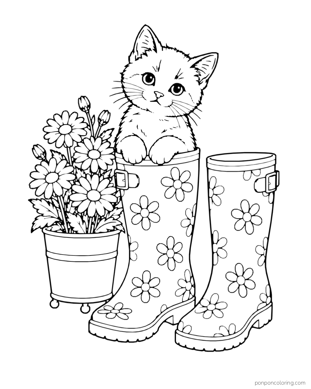 A kitten peeks from one of two floral rain boots beside a pot of daisies.
