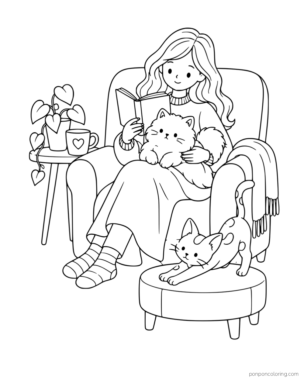 A woman reading in an armchair with a fluffy kitten on her lap and a spotted kitten on a footstool.