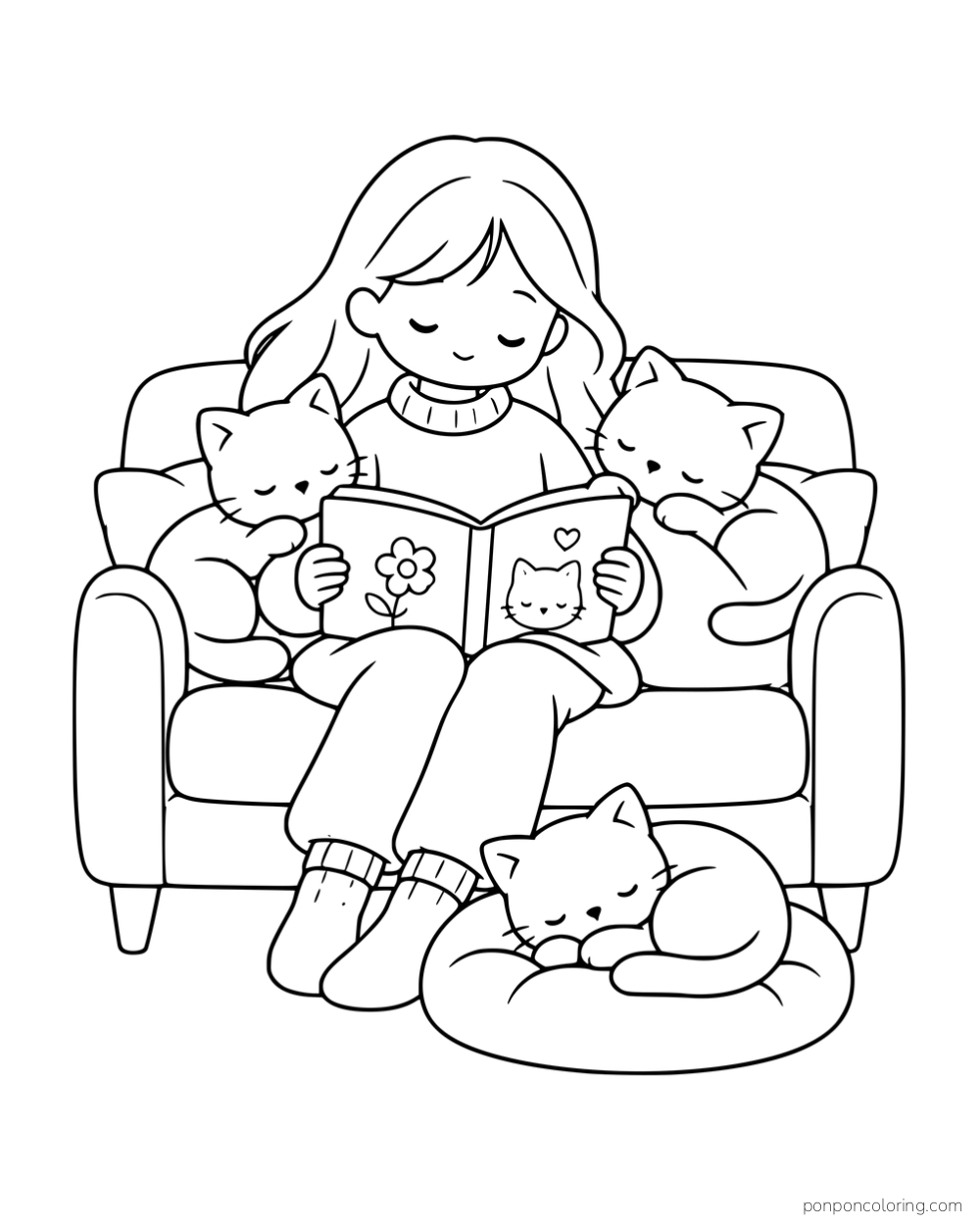 A woman reading a picture book on a sofa with two kittens beside her and another sleeping on a cushion.