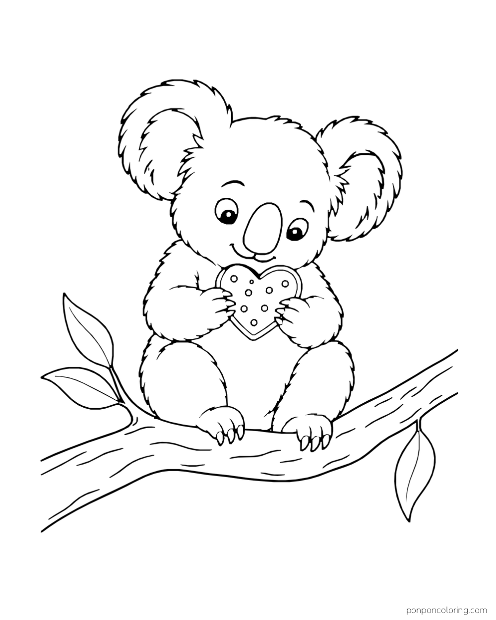 A koala sits on a eucalyptus branch and holds a heart-shaped cookie in its paws.