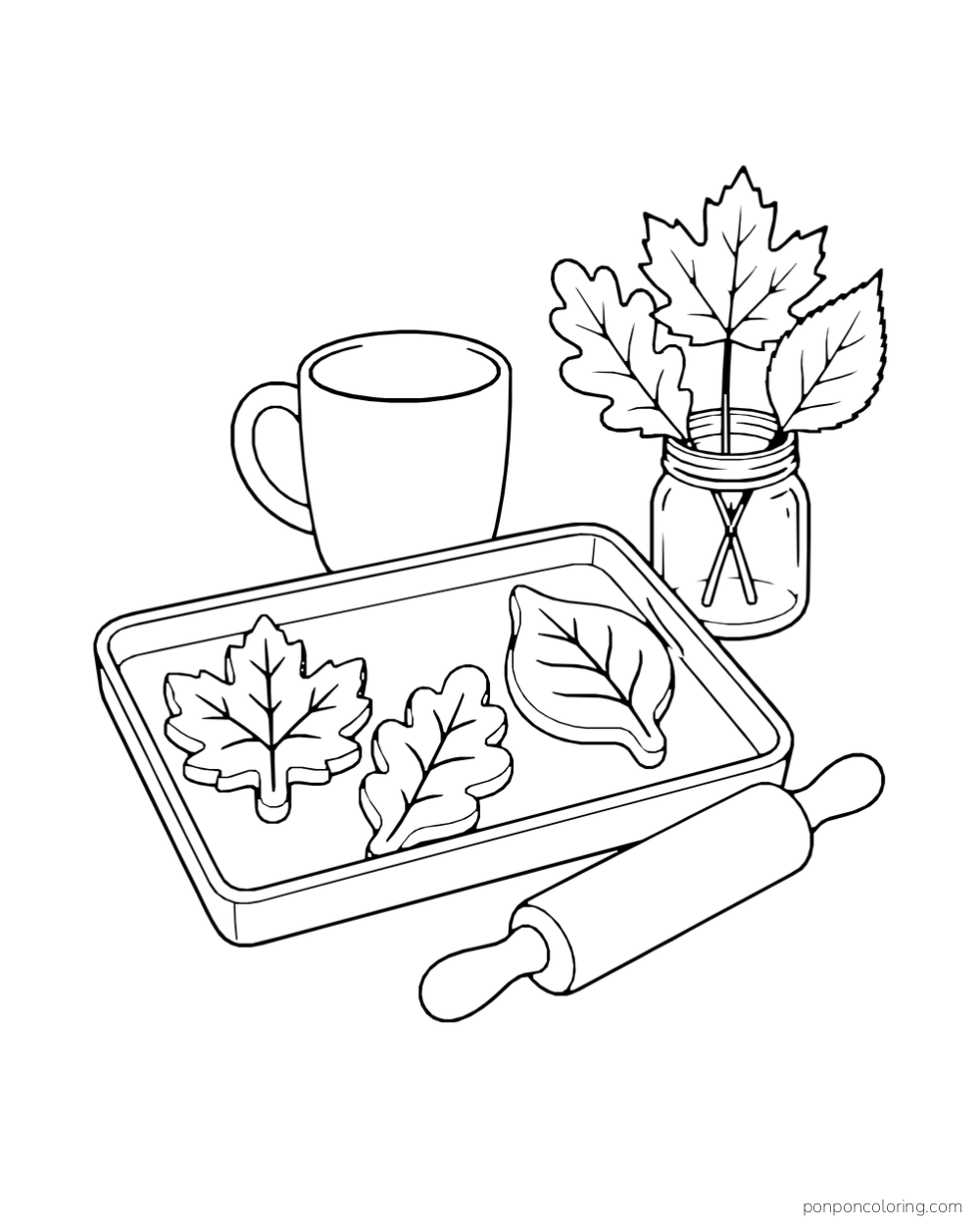 Leaf-shaped cookies rest on a tray beside a rolling pin, mug, and jar of real leaves.