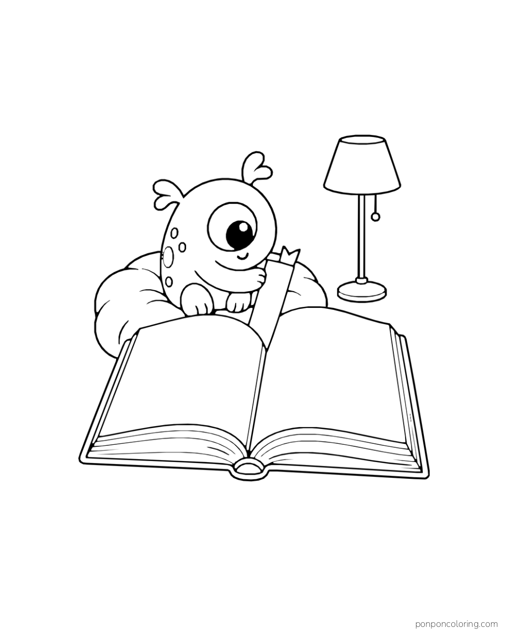 Small one-eyed monster on a cushion holding a bookmark over a large open book beside a lamp.