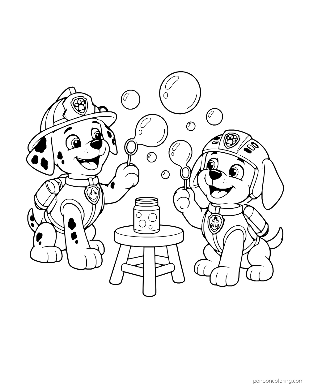 Marshall and Zuma blow bubbles beside a bubble jar on a stool.