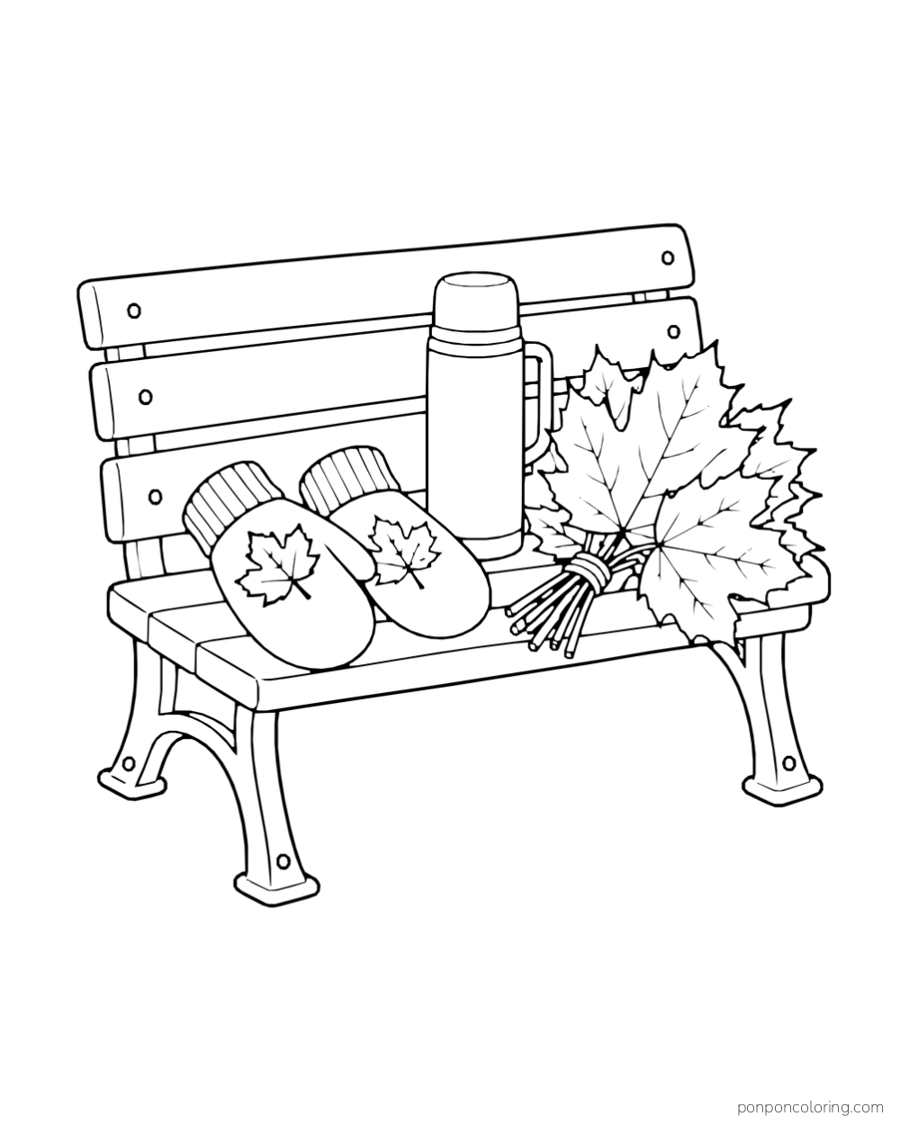A pair of mittens, a thermos, and a tied bundle of leaves rest on a bench.