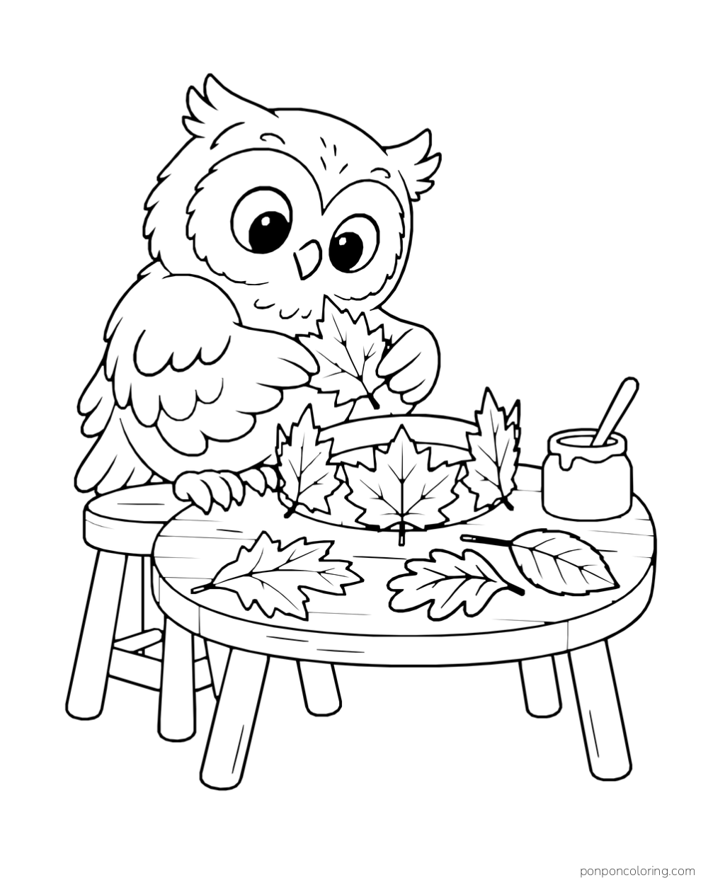 An owl works with broad leaves at a round table, with a cup and more leaves nearby.
