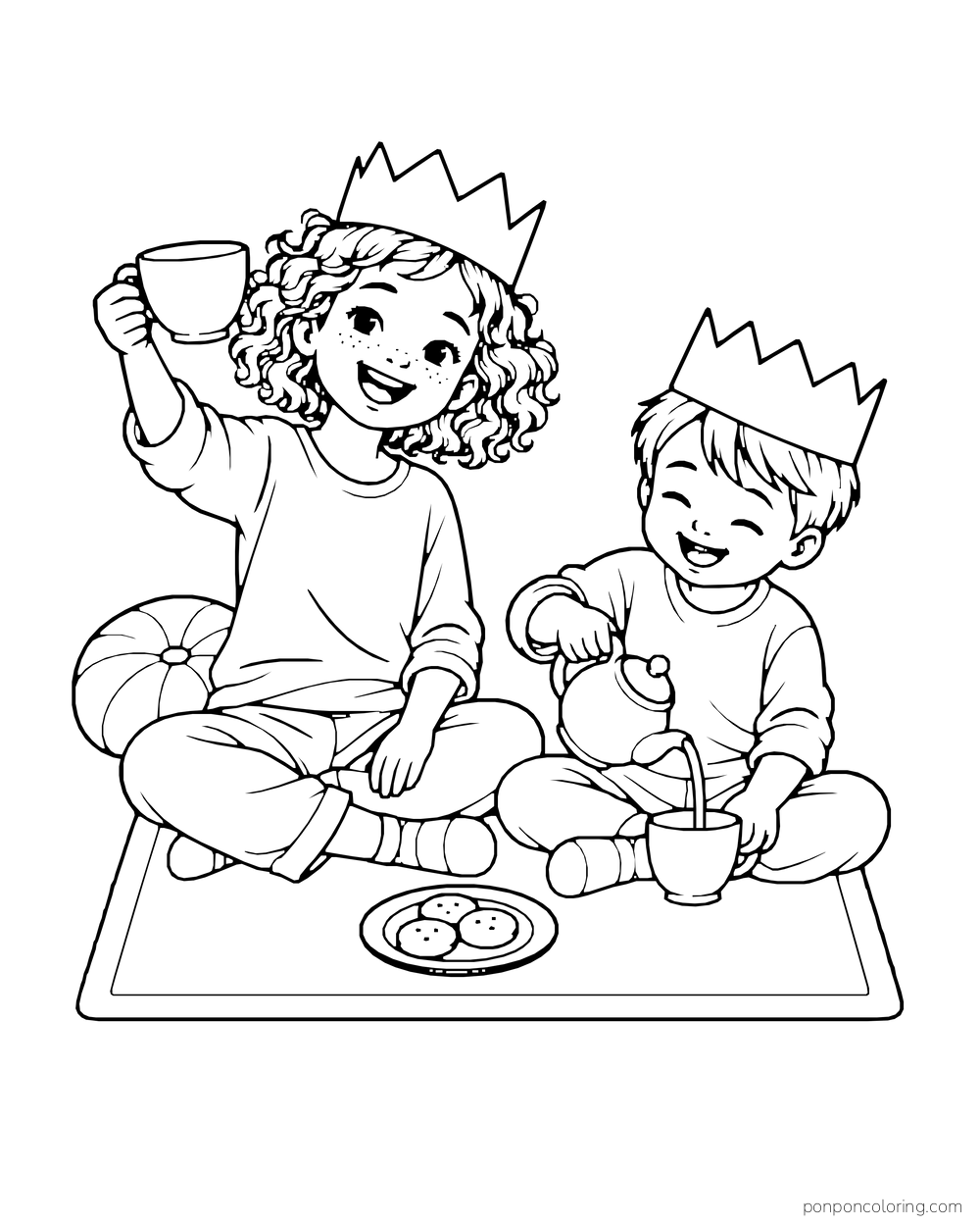 Two children wearing paper crowns sit on a blanket with tea and cookies.