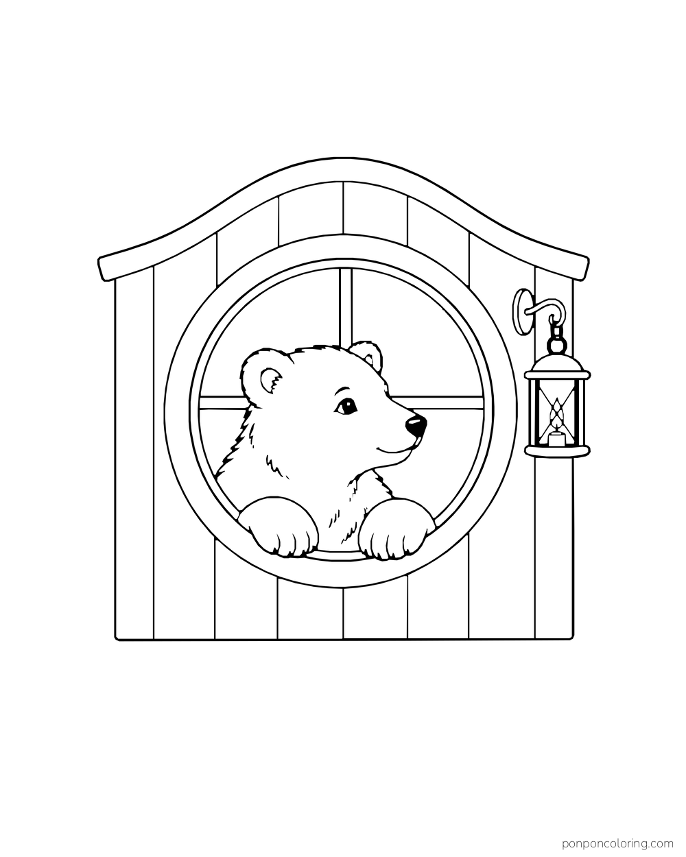 A polar bear cub peeks through a round window with a lantern hanging outside.