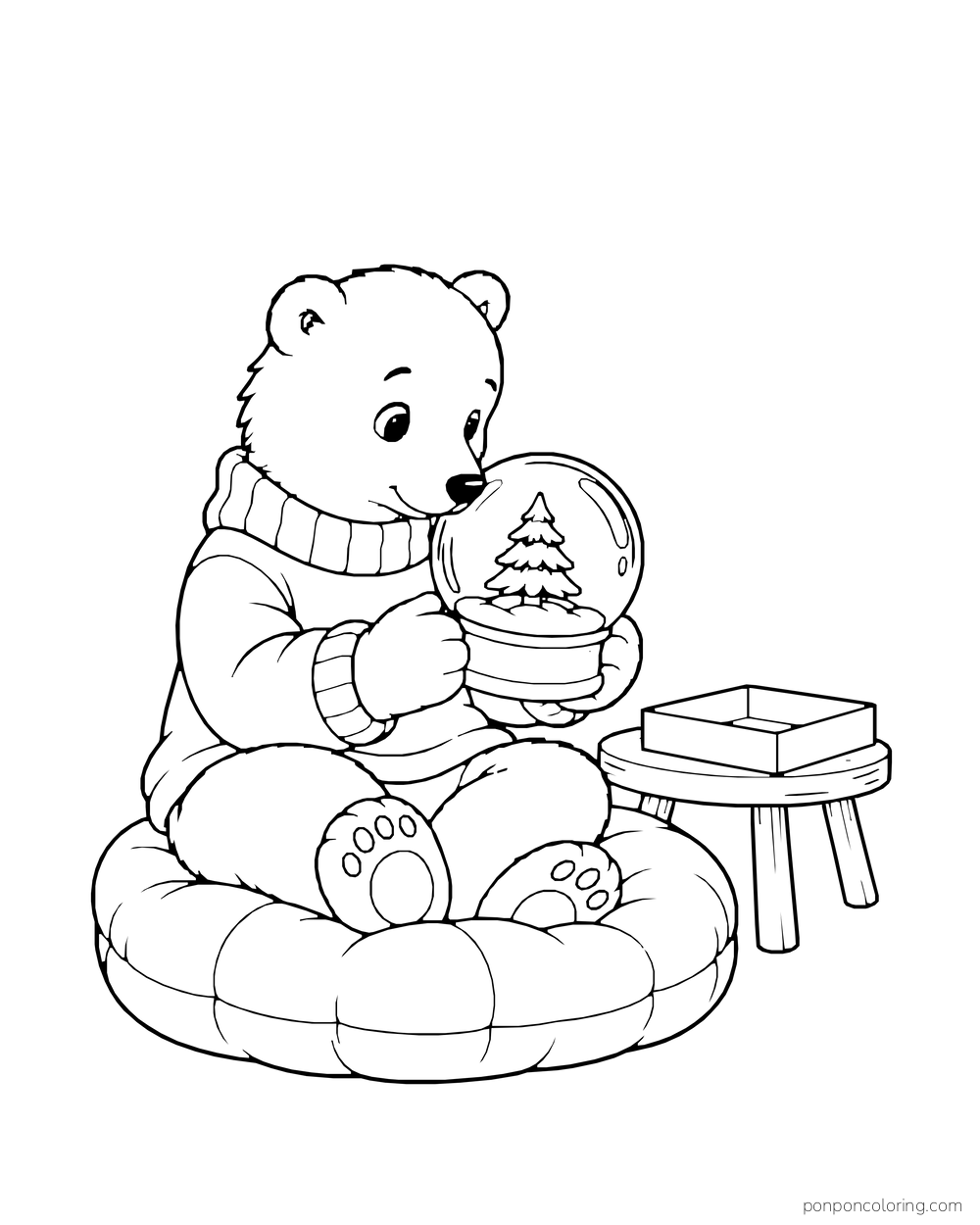 A polar bear cub sits on a cushion holding a snow globe with a little fir inside.