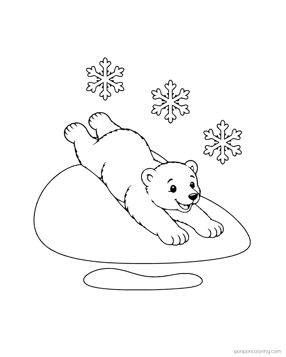 A polar bear cub slides belly-first down a rounded snowy hill.