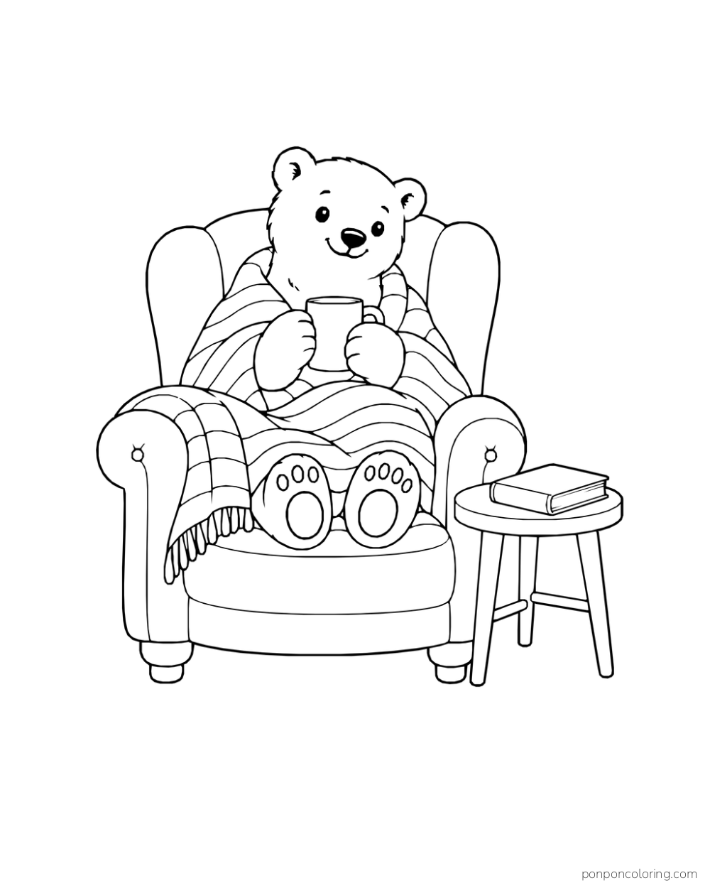 A polar bear cub sits in a padded armchair under a striped blanket, holding a mug beside a small table and closed book.