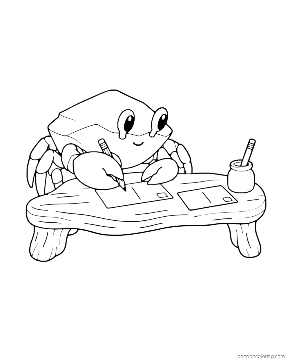 A crab sits at a low wooden table with two blank postcards and a cup.