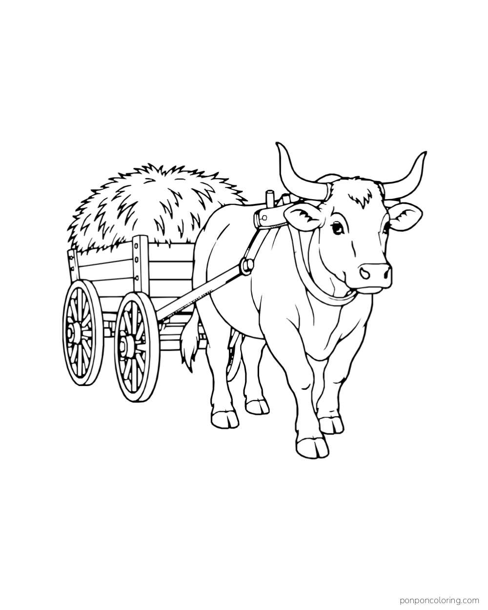 An ox in a harness pulls a wagon loaded with hay.