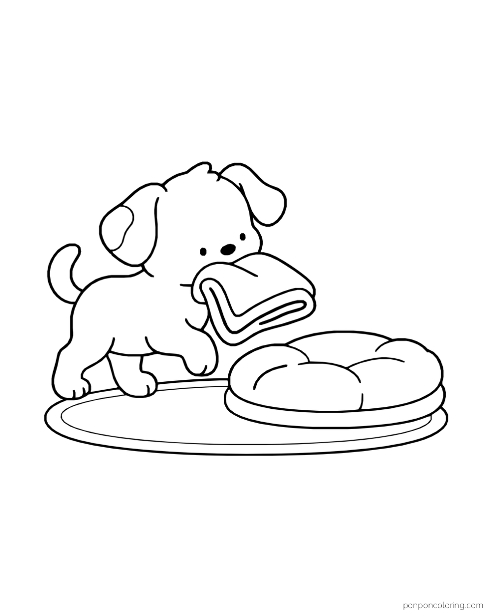 A puppy with a patch on one ear carrying a folded blanket toward a cushion on an oval rug.