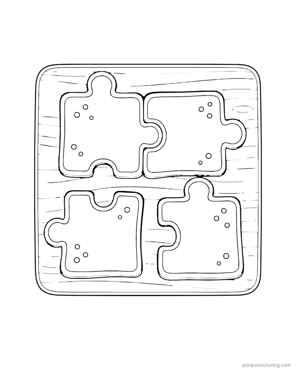 Four jigsaw-shaped cookies, two connected, rest on a square serving board.