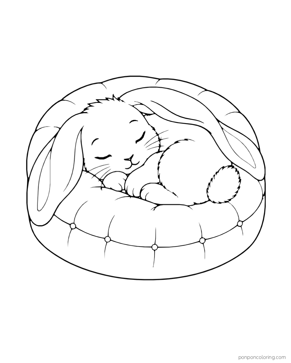A rabbit sleeps curled in a round tufted cushion with its ears folded down.