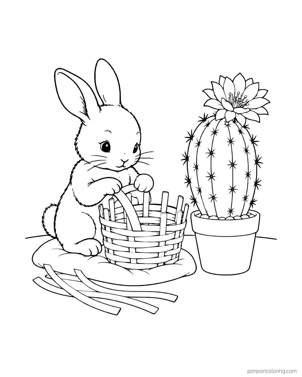 A rabbit weaves a wicker basket on a cushion beside a potted flowering cactus.