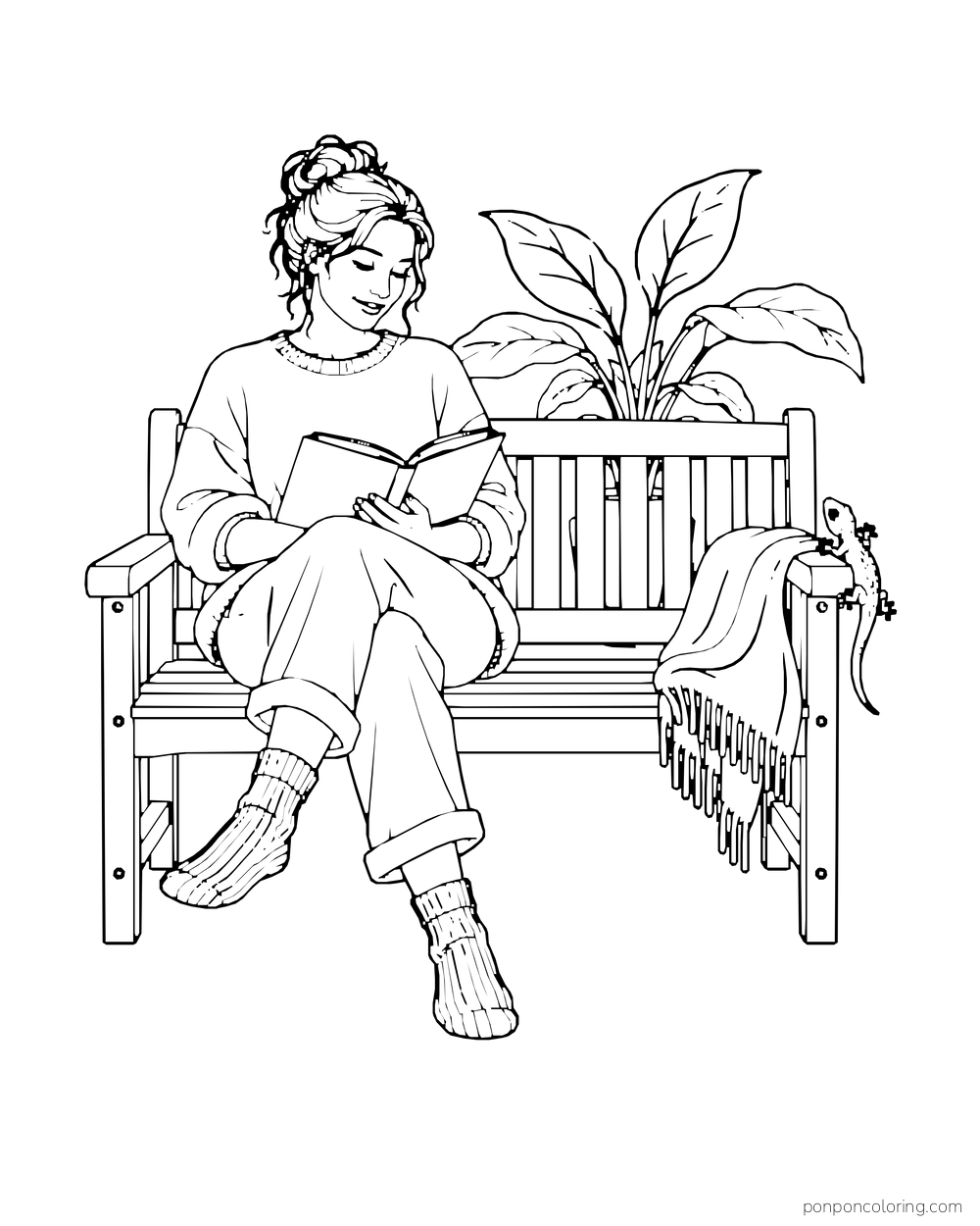 An adult reads on a garden bench while a small gecko clings to the arm beside a fringed blanket.