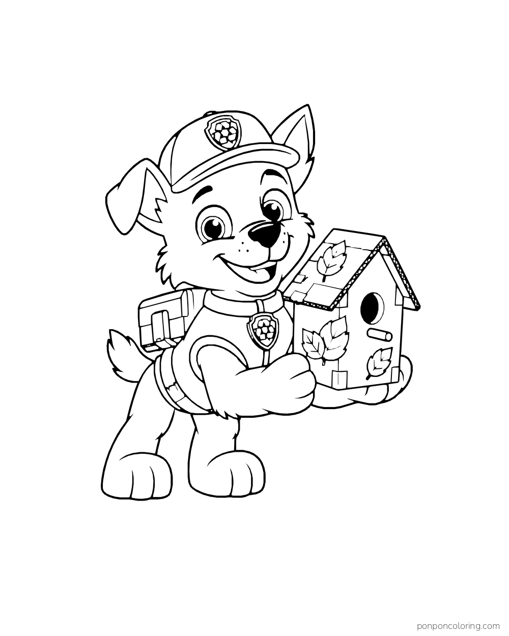 Rocky holds a small birdhouse decorated with leaves.