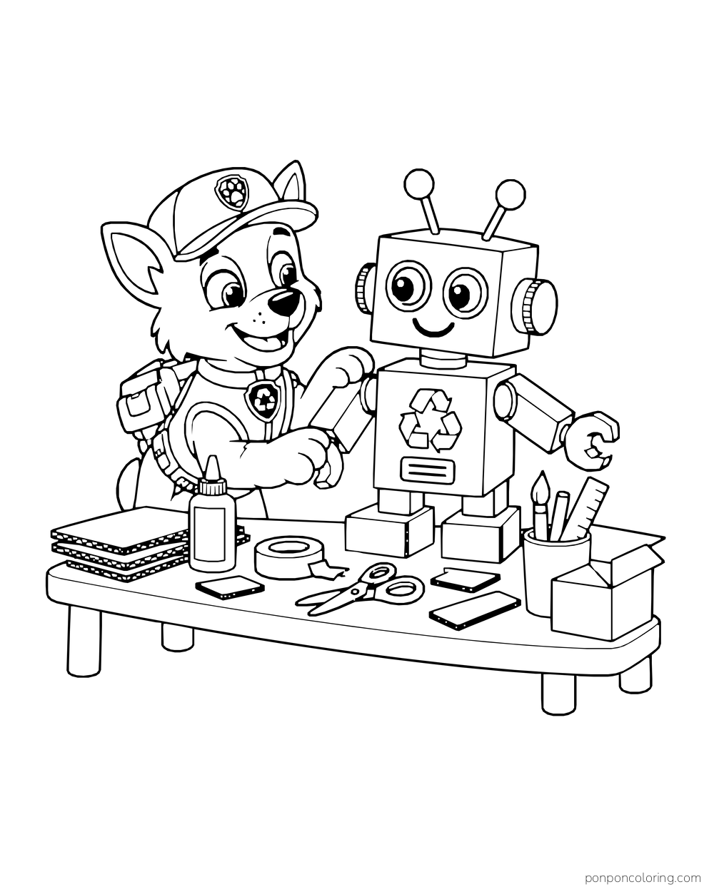 Rocky builds a cardboard robot at a craft table with glue, scissors and boxes.